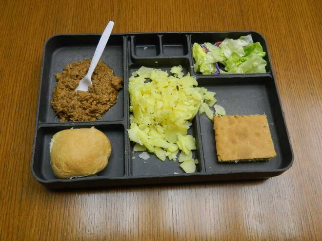 food delivery tray for repaired food. Chicken nuggets, bread. Cookies.
